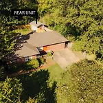 Centrally Located Memphis Tiny Home Queen Bed Rear