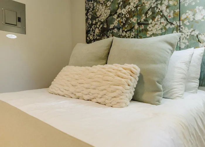 Centrally Located Memphis Tiny Home Queen Bed Rear