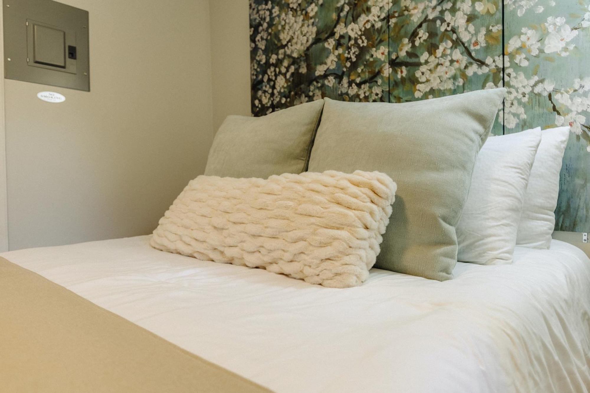 Centrally Located Tiny Queen Bed Rear *